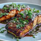 Grilled salmon with strawberry salsa, a vibrant spring dinner with juicy salmon fillets and zesty fruit topping.