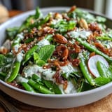 Crisp, refreshing snap pea and radish spring salad ready for summer enjoyment.